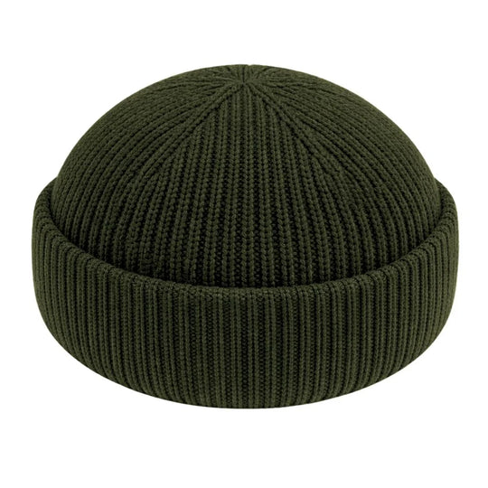 Fisherman beanie for men cotton. Green knit beanie on a white background