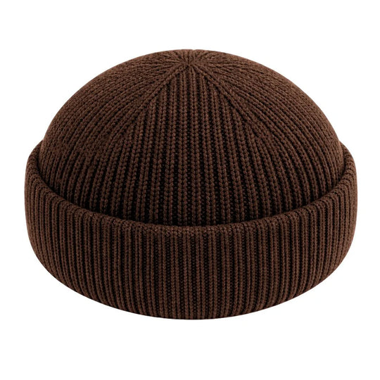 Best fisherman beanie to buy. Brown knit beanie on a white background